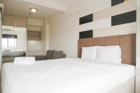 Comfort Living and Minimalist 1BR at Bassura City Apartment By Travelio